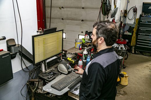 Auto Solve advisor reviewing diagnostic findings on screen before recommending any repair