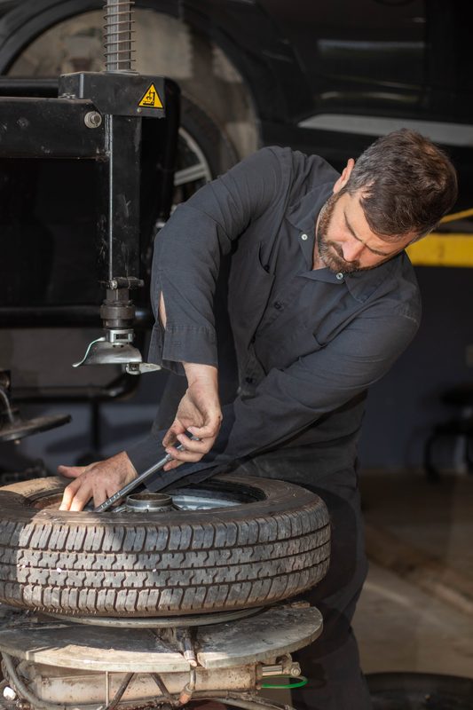 Tire iron on spoke wheel