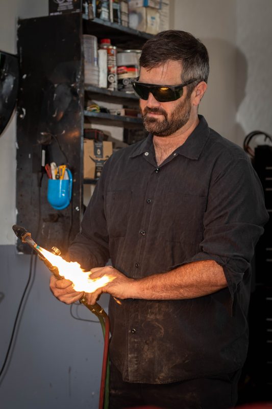 Mechanic with safety glasses